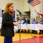 A Wyndham resident addresses the Wyndham HOA and Smart Development Task force meeting at Shady Grove Elementary School.