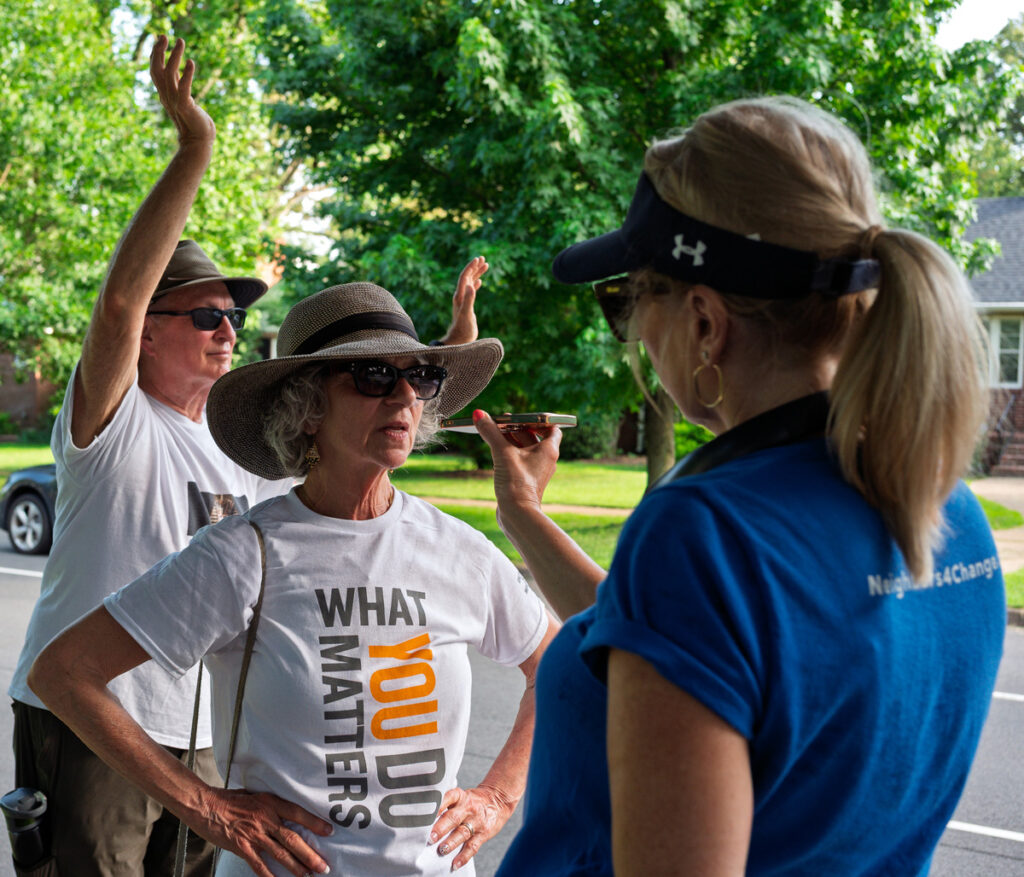 Woman being interviewed by Neighbors For Change at the Good Trouble Protest